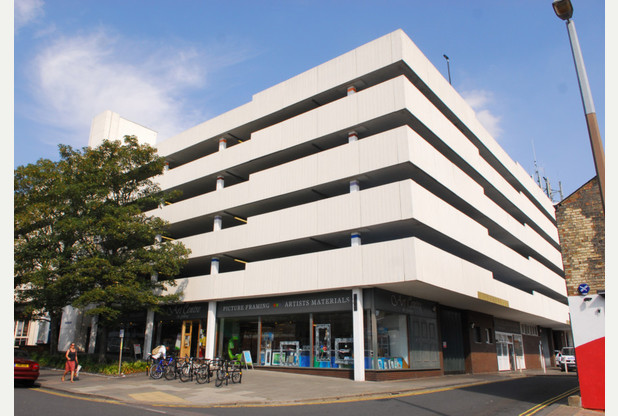 Lurk Street Car Park with white walls. 