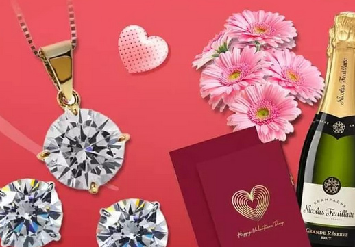 A diamond solitaire necklace and flowers and bottle of champange