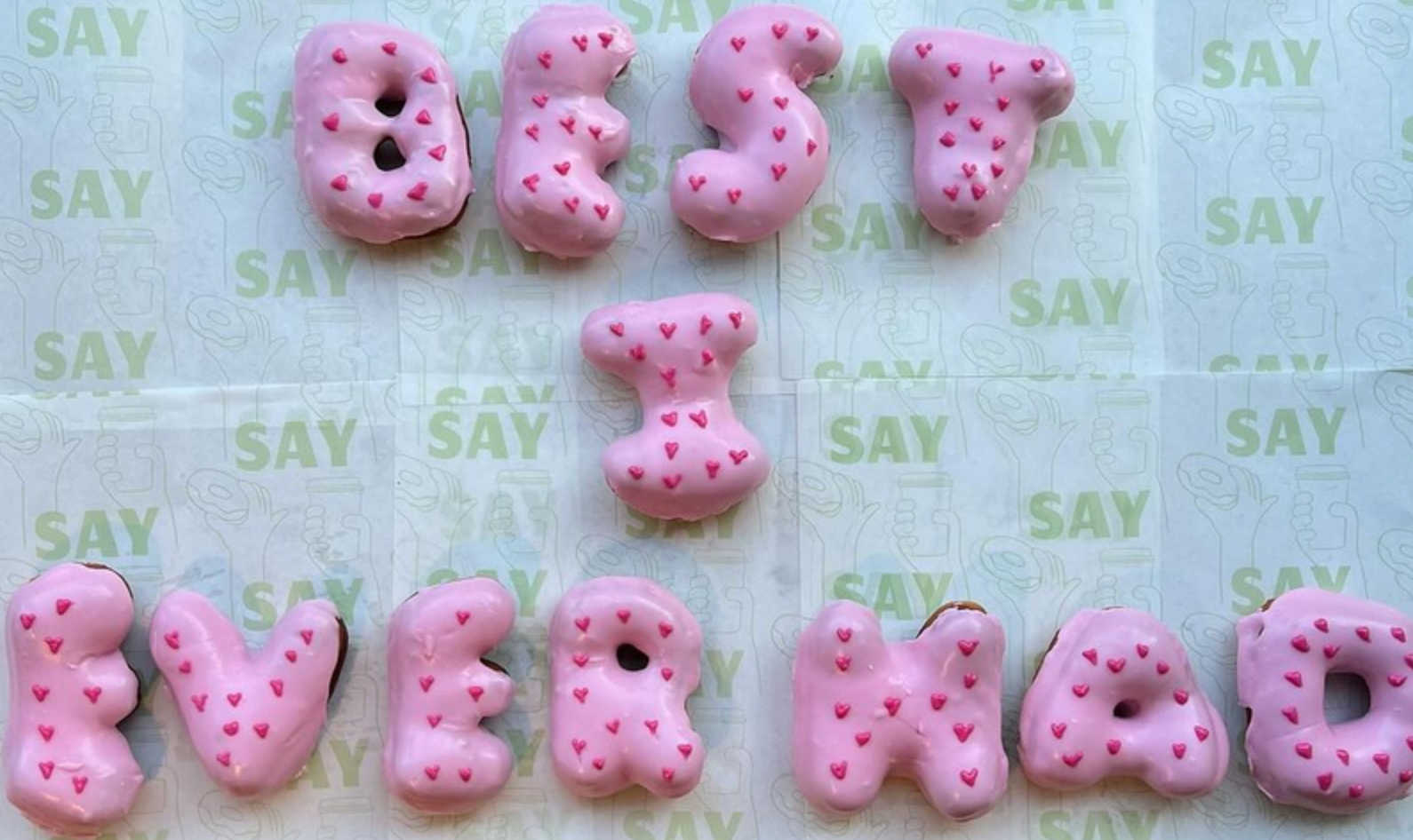 Pink donuts in letter shapes spelling the words best I ever had