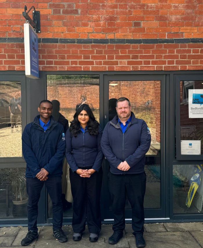 BedfordBID town centre champions photographed infront of the office. Two men and one lady.