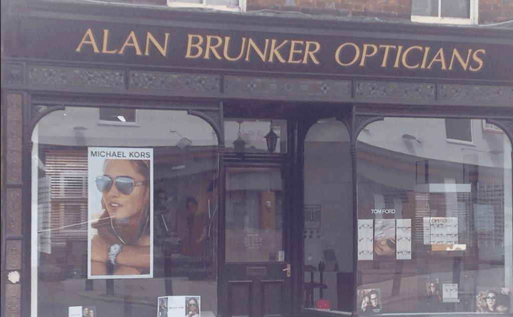 Alan Brunker heritage shopfront with grey structure and gold writing
