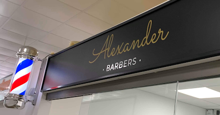 Alexander Barber shopfront with gold and white wording on black background