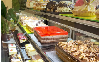 Artisan Bakery glass shopcounter with cakes