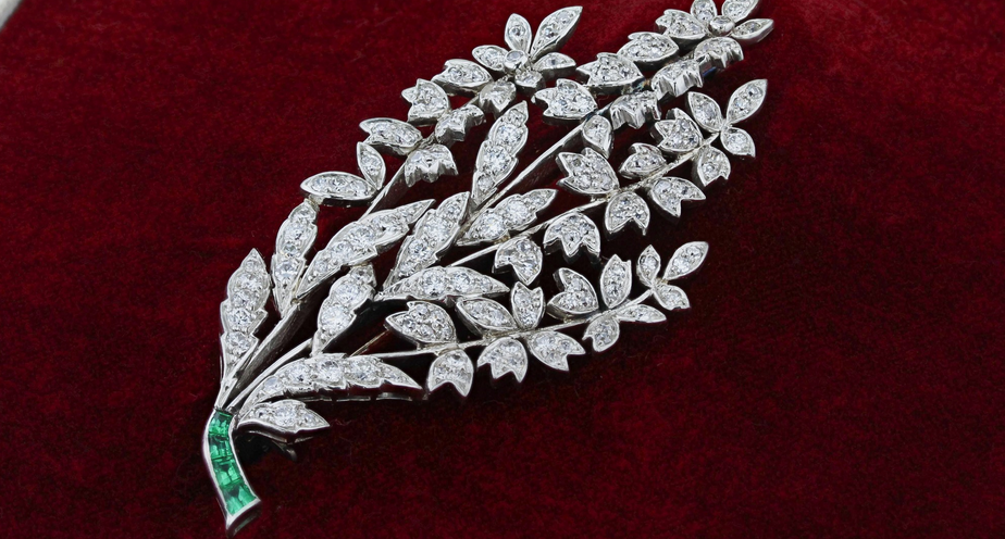Baker Bros diamond and emerald leaf designed brooch