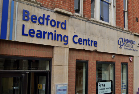 Bedford IT Training Centre brick and stone shopfront with blue branding