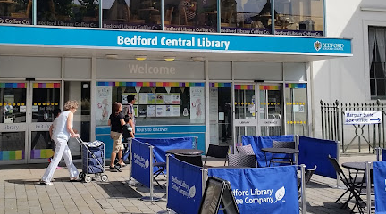 Bedford Library street view with white and turquoise signage