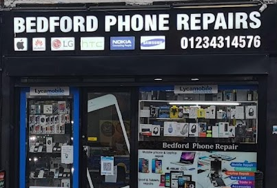 Bedford Phone Repairs shop front white writing on black