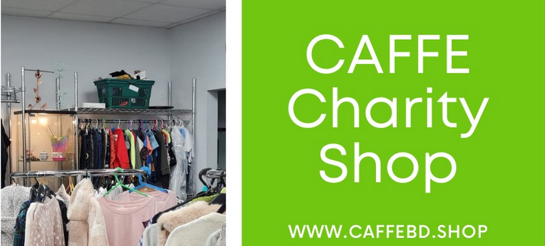 CAFFE charity shop and sign with white writing on green background