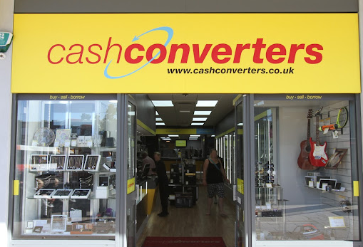 Cash Converters shopfront with glass windows and yellow and red signage