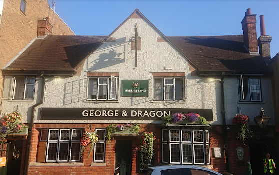 George & Dragon street view brick and cream with brown, green and gold signage