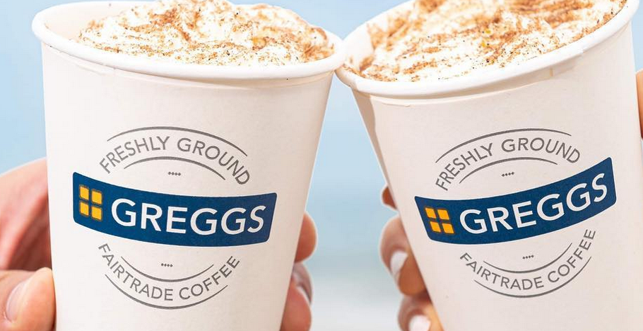 Greggs couple holding coffees with whipped cream