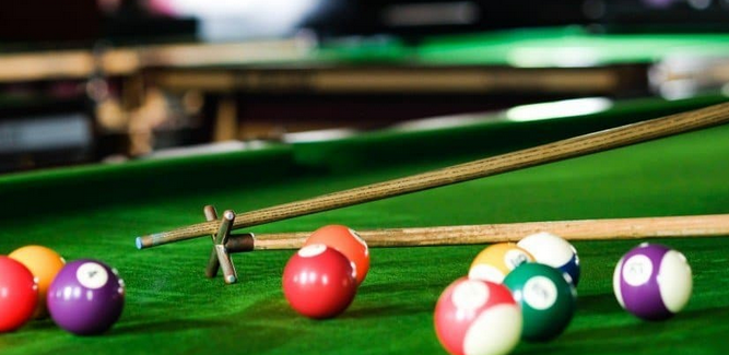 Greyfriars SC pool table with balls and cues and support