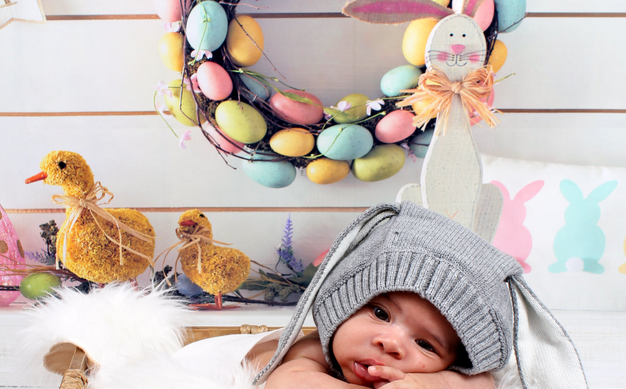 KJ Photography baby with bunny ears hat with Easter decorations and toys