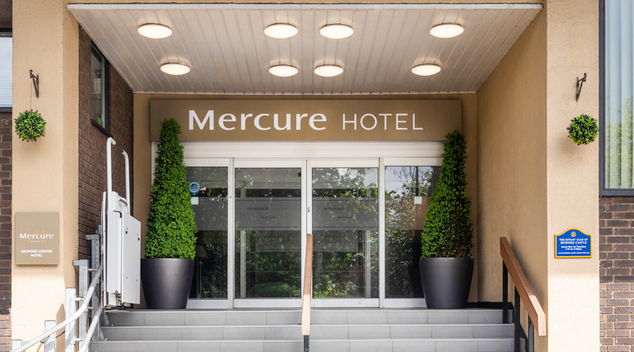 Mercure hotel street view with cream and white entrance