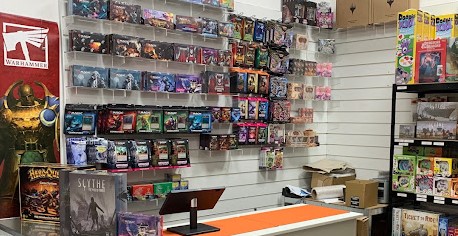 Onyx Dawn shop interior with shelves of games and figurines