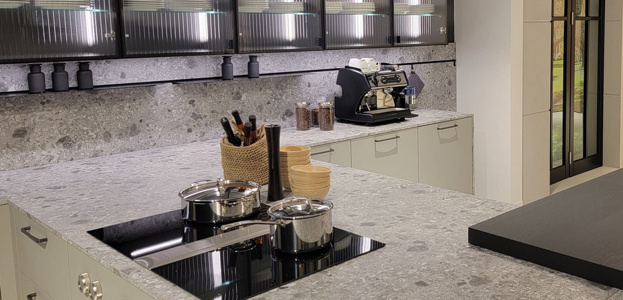 P & R Interiors modern kitchen with sleek white units and granite worktop