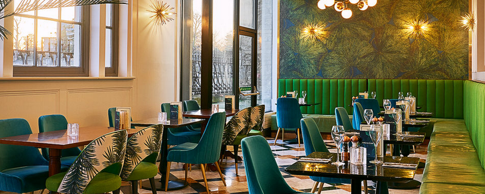 Pen & Cob dining in art deco style and vibrant greens and blues