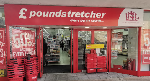 Poundstretcher with red and white boarding and branding
