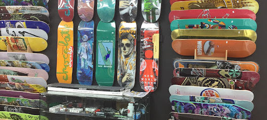 Rollback World selection of skateboards on the wall in-store