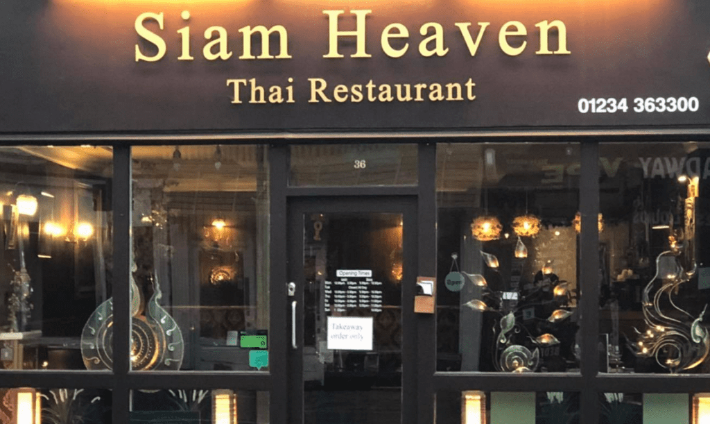 Siam Heaven shopfront with brown and gold boarding