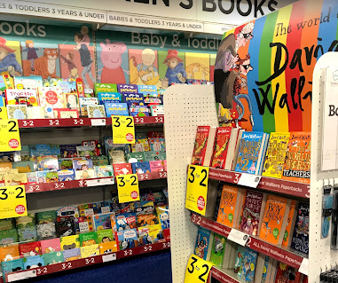 WH Smith bookshelves with children's books and special offers