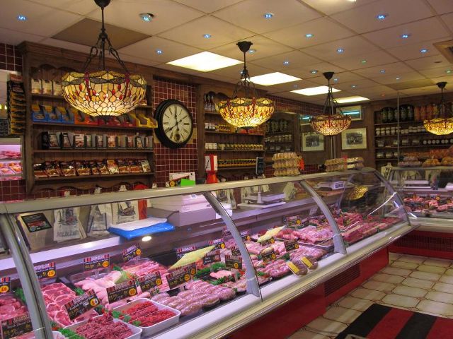 DP Butchers Church Arcade period lighting traditional butchers with long glass display counters