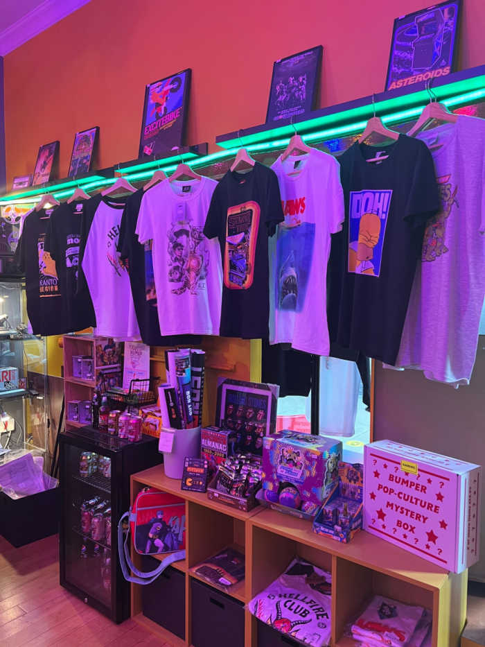 Tshirts on a row with pictures and board games