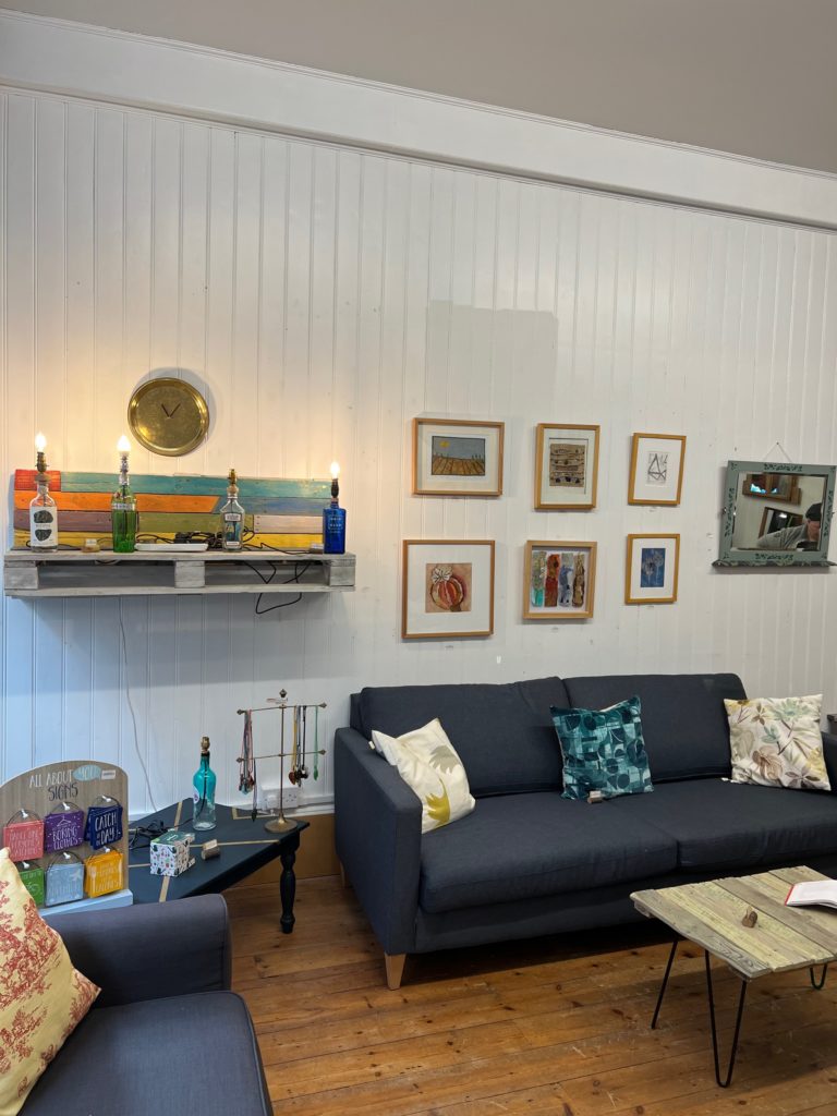 IMPAKT shop with wall art, upcycled furniture and soft furnishings