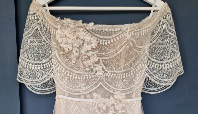 Gown Up intricately designed lace and beaded off the shoulder wedding dress