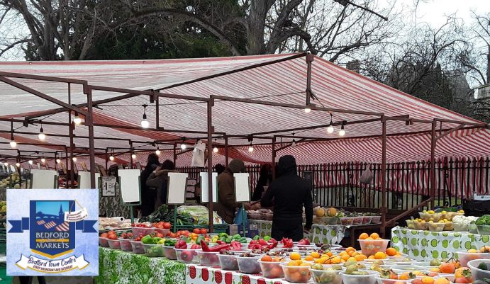 Bedford Market showing fruit and veg stalls