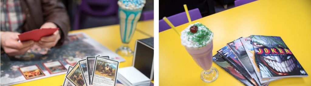 Geek Retreat sundae with people playing cards, games and magazines on a yellow laminate table