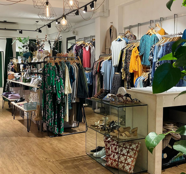 Planet Boutique showing rails of clothing, plus display of shoes, accessories and homewares