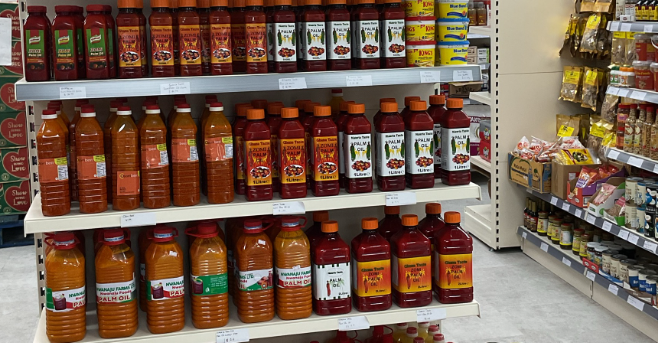 Bquality Africa Mini Mart shelves of tomato sauces