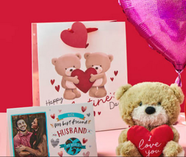 Valentines day cards, a teddy bear toy with a hear and a heart shaped balloon