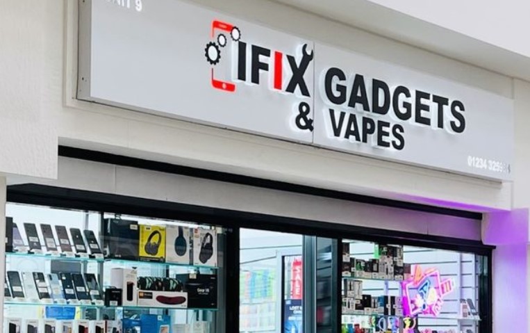 Ifix shopfront with red and black writing on white background