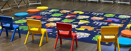 Bedford Library baby mat with colourful characters
