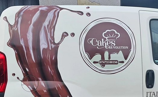 Cakes Re-volution van with chocolate swirl and logo