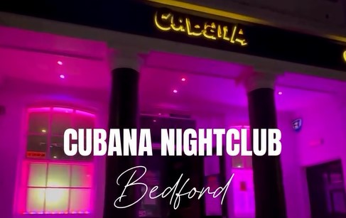 Cubana Nightclub entrance in evening with purple lighting