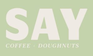 Logo for SAY doughunts and coffee in pastel green.