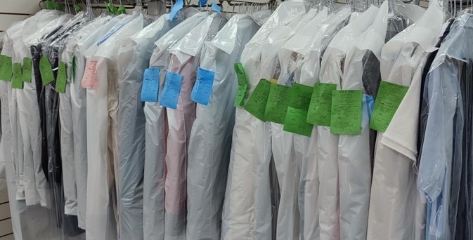 Bedford Dry Cleaners dry cleaned clothes in plastic covers