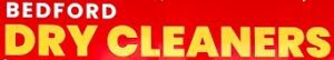 Bedford Dry Cleaners logo with yellow and white writing on red background