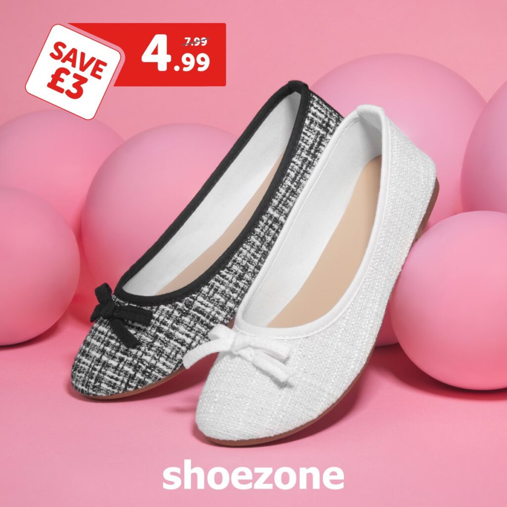 Ballerina fashion shoes, one white shoe and one black shoe. Set on a pink background
