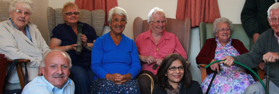 Elderly people sitting in a group